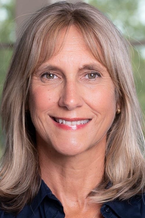 Dana Stevens as Hostess