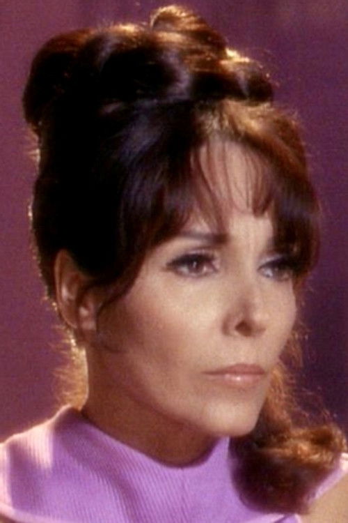 Natalie Norwick as Janet Murch