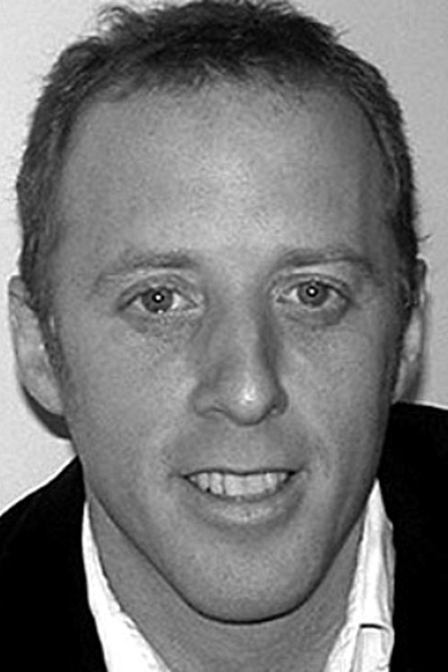 Jay Reiss as Christmas Caroler