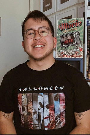 Santiago Gaviria Ospina as News announcer