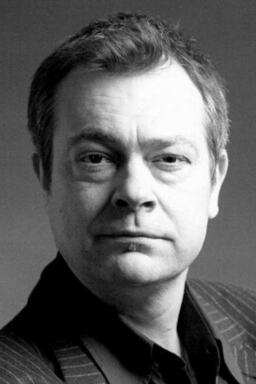 Michael Hofland as Belgian visa officer