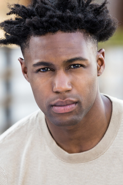 Omar Brunson as Reggie Hall