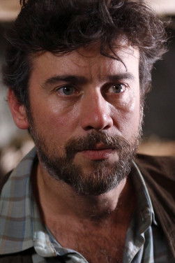 András Istvan Demeter as Catholic Priest Vasvari