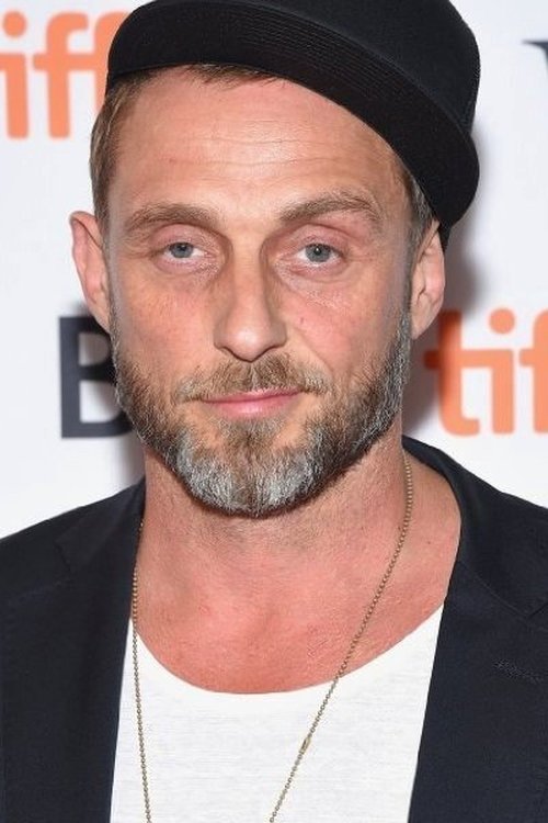 Roland Marko Simmonds as Cop