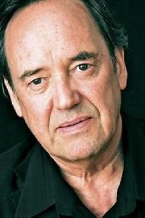 Shaun Lawton as Man with Cigar