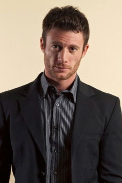 Tommaso Caporali as David E. Poplawsky