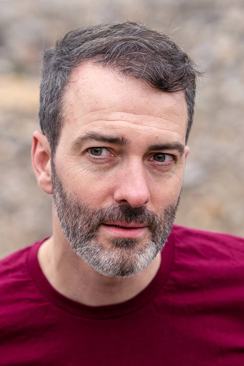 Thomas Kühl as John