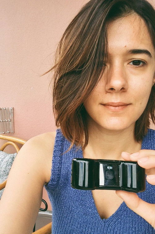 Emma Doxiadi as Woman