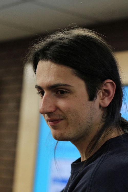 Caleb Noble as Extra (Patient on Operating Table & Crutches)