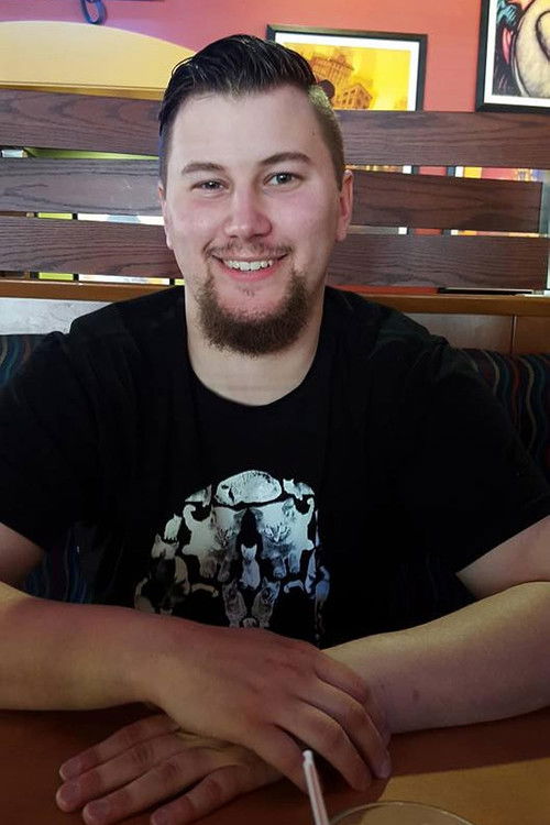 Chris Ihlenfeldt as Café Patron