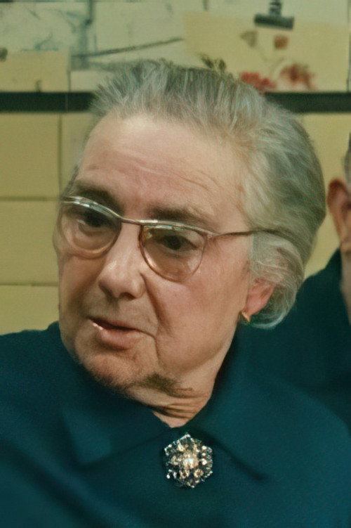 Marie-Louise Thierry as Madame Minguet