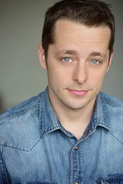 Ben Adams as Russ