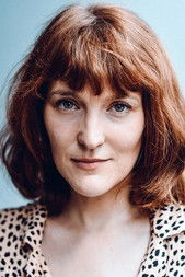 Marie Combeau as Palace receptionist