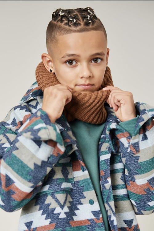 Treyston Braine as Urchin 2