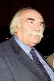 Nikos Kouros as Μπάμπης