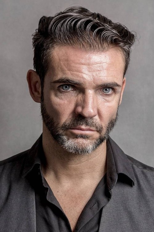 Javier De la Vega as Blake