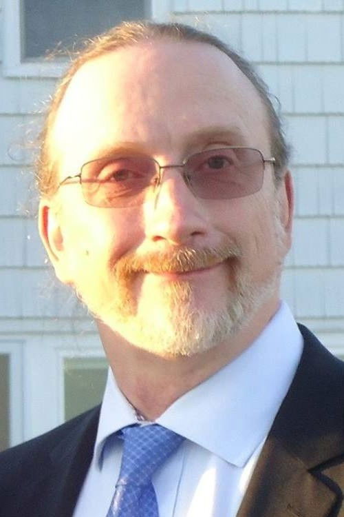 John Marean as Tattoo shop owner