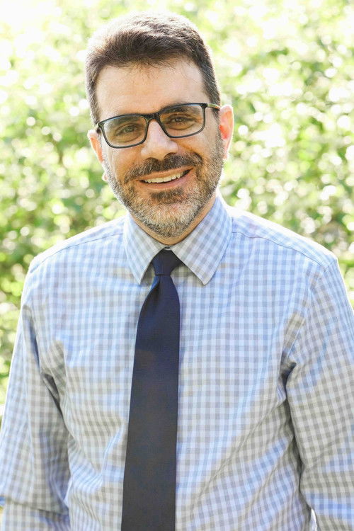 Mark Kaiserman as Rabbi