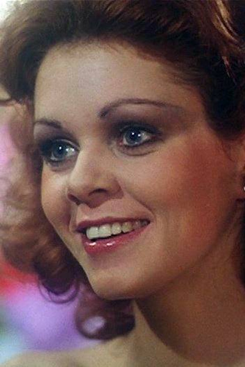 Lynne Ross as Garage Secretary