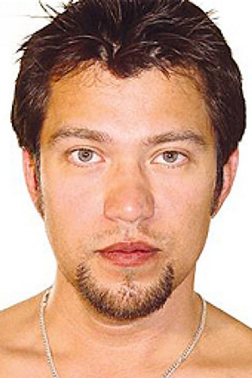 Adrian Hart as (archive footage)