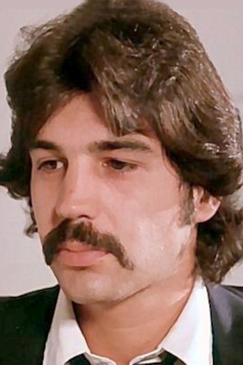 Turk Lyon as Party Guy in Blue Shirt