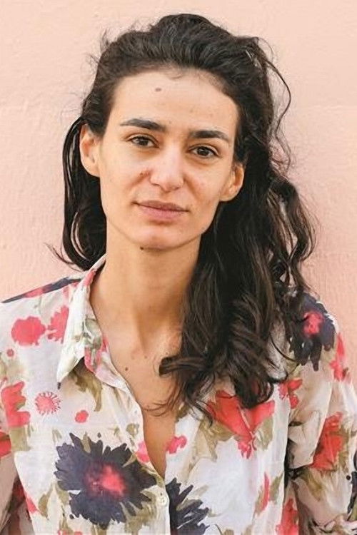 Marta Mateus as Rapariga da bomba de gasolina