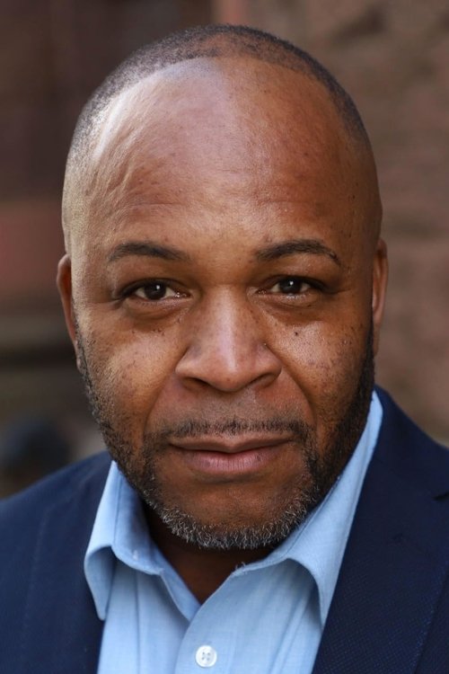 Michael Everett Johnson as The Priest