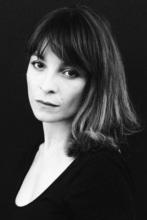 Chiara Gioncardi as Italian Emigrant (voice)