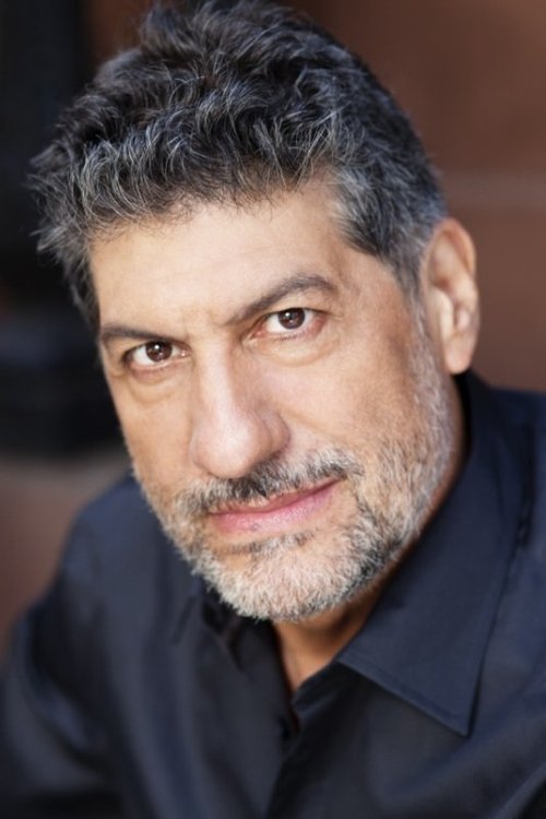 Michael De Nola as Open Mic Emcee