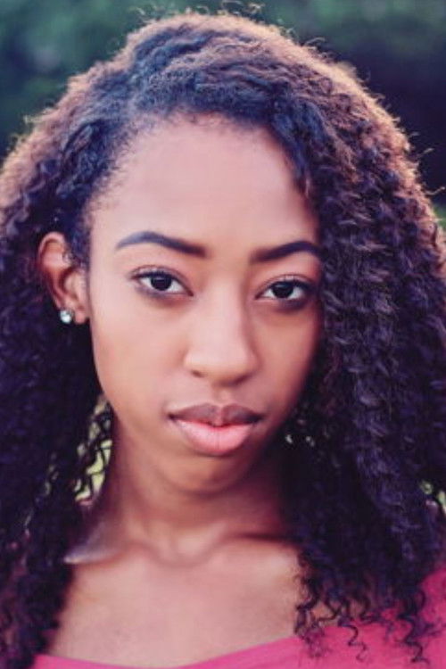 Charis Gullage as Charis