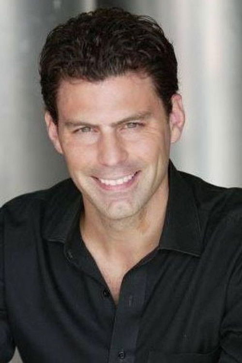 Brian Gallegos as Greg Hudgins