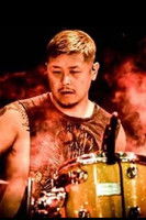 Eiji Matsumoto as God of Drums (Dark Night Carnival)