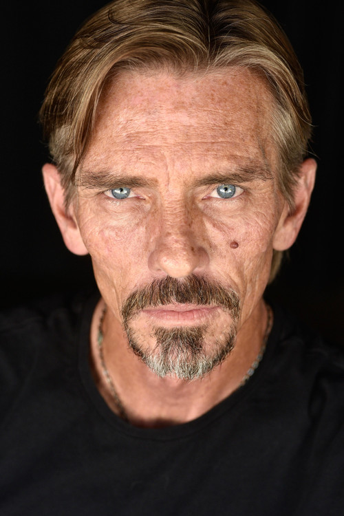 Charles Baker as Chase