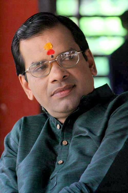 Pushpakath Geethanandhan as Astrologer