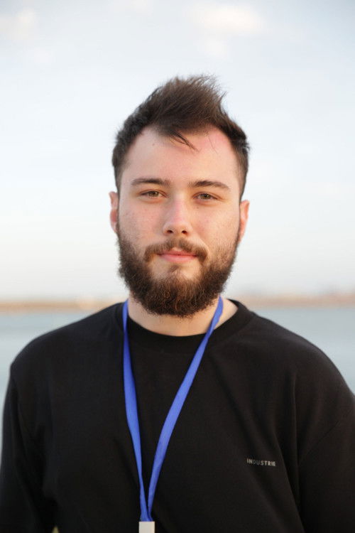 Dylan Robertson as Extra