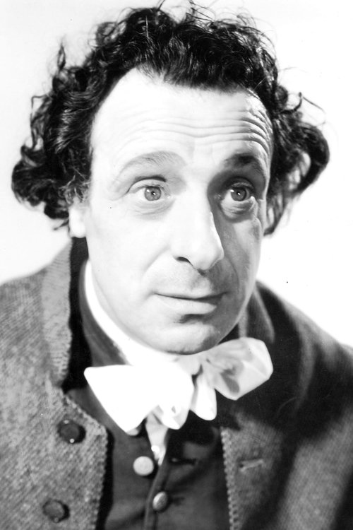 Luis Alberni as The Barber