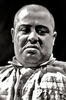 Gib Grossac as Announcer for the show at the funfair