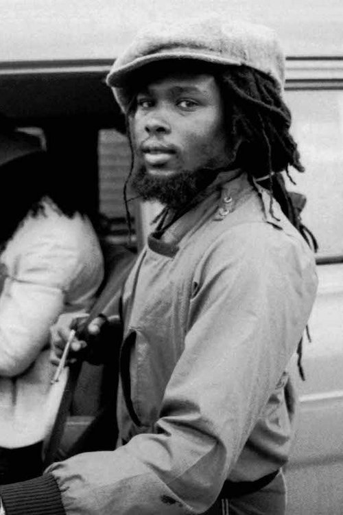 Robbie Shakespeare as Don Next Door