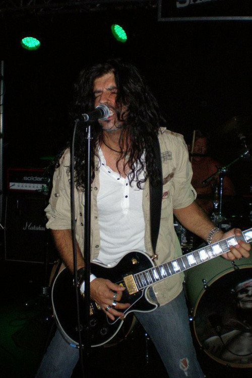 Michael Olivieri as Vocals / Guitar
