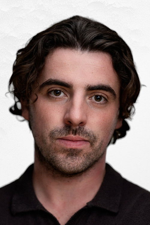 Gordon Quigley as Scarred Prisoner