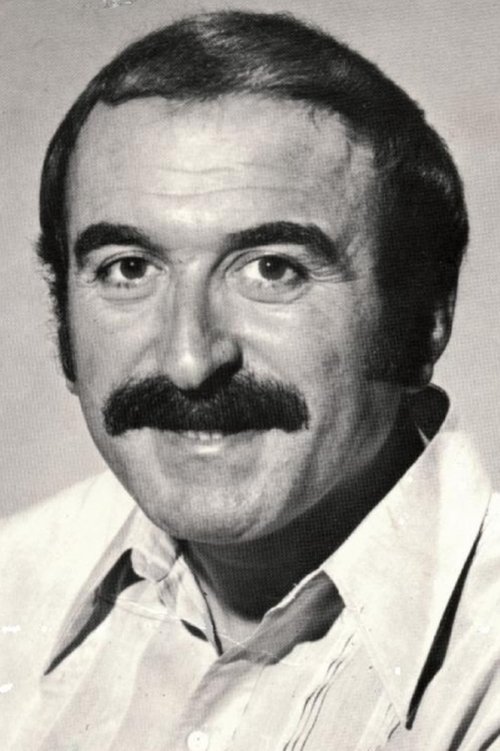 Jean Sas as Sports commentator with the moustache