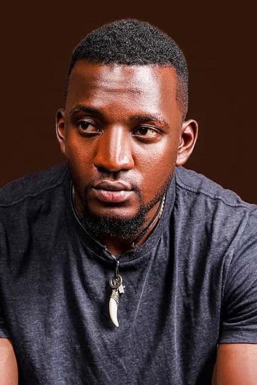 Quincy Rapando as Prison Guard 1