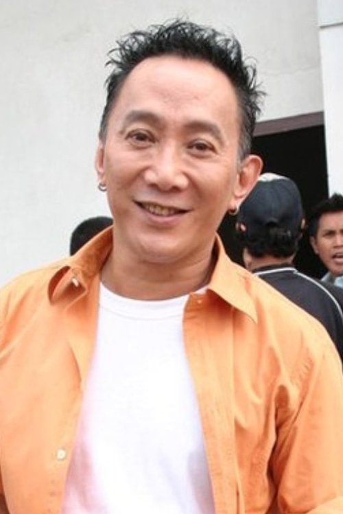 Robby Tumewu as A Miauw / Ayah A Ling (Pemilik Toko Sinar Harapan)