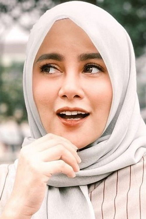 Olla Ramlan as Uma Arian