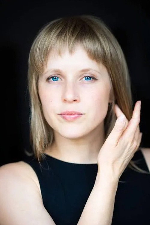 Rebecca Riisness as Trinity (voice)