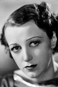 Kay Strozzi as Madame Anna Valeska, aka Gladys