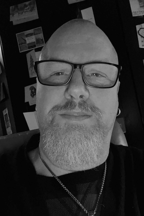 John E. McLenachan as Camper