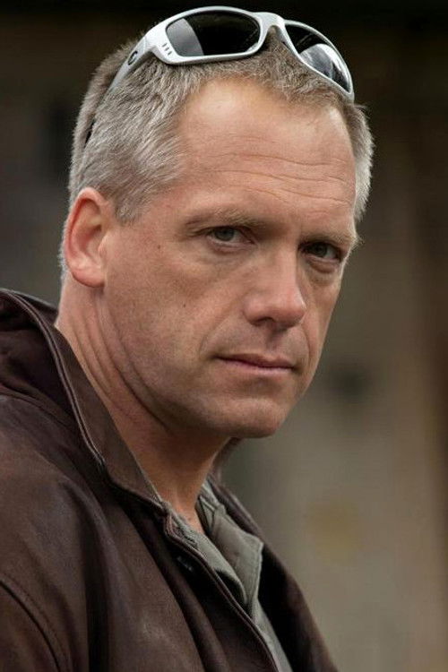 Paul Radki as Officer Theo