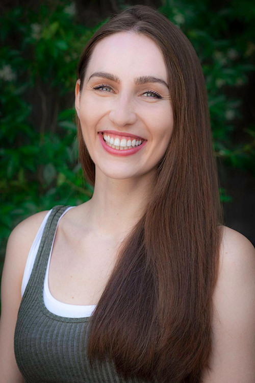 Dora Hart as Larissa