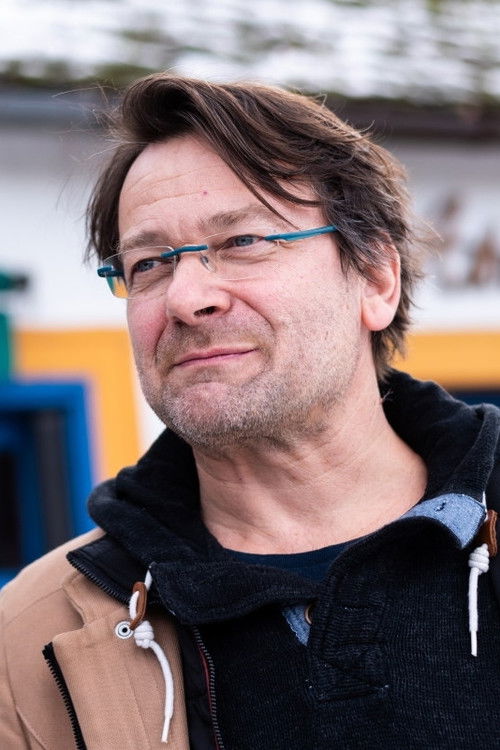 András Lovasi as The singer